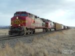 BNSF 738 and BNSF 619 with a long load